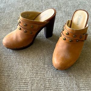Brown studded clogs